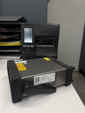 Tagged unit next to RFID Printer